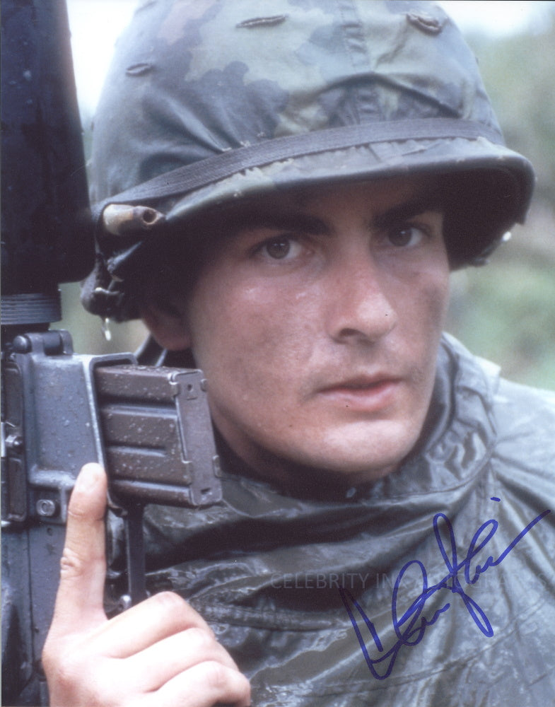 CHARLIE SHEEN as Chris - Platoon